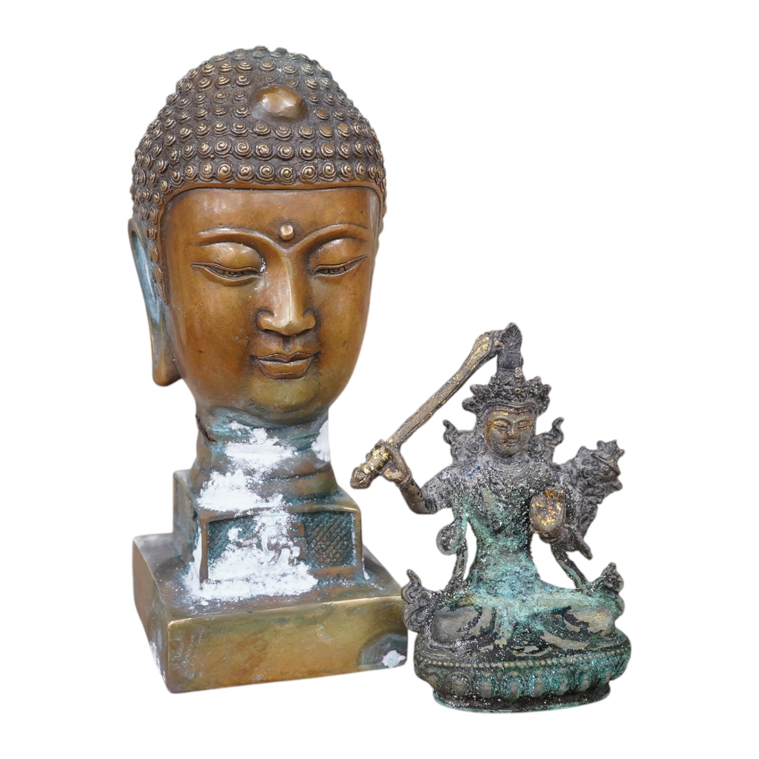 A large Buddhist head seal and seated figure of Tara, largest 19cm high. Condition - fair